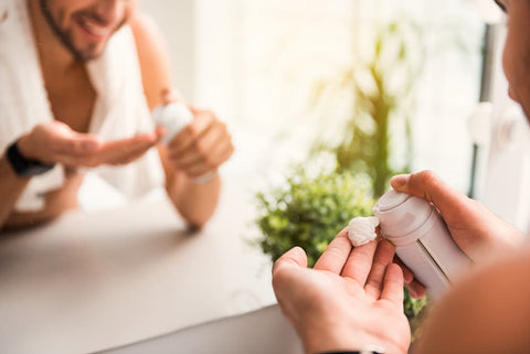 man using levo made shaving cream