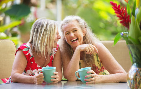 two women laughing