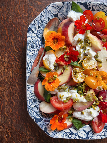 Nectarine & Burrata Salad ingredients served on Burleigh Pottery