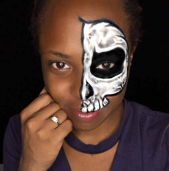 half skull face paint girl