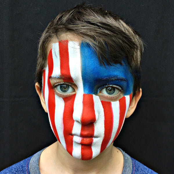 Premium Photo  A man with a blue face paint and a red and white