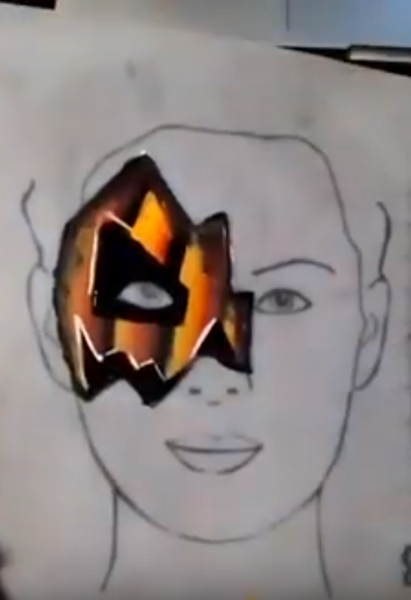 Half Face Jack-O-Lantern Face Paint Design