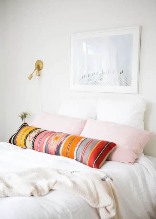 lumbar pillow on bed