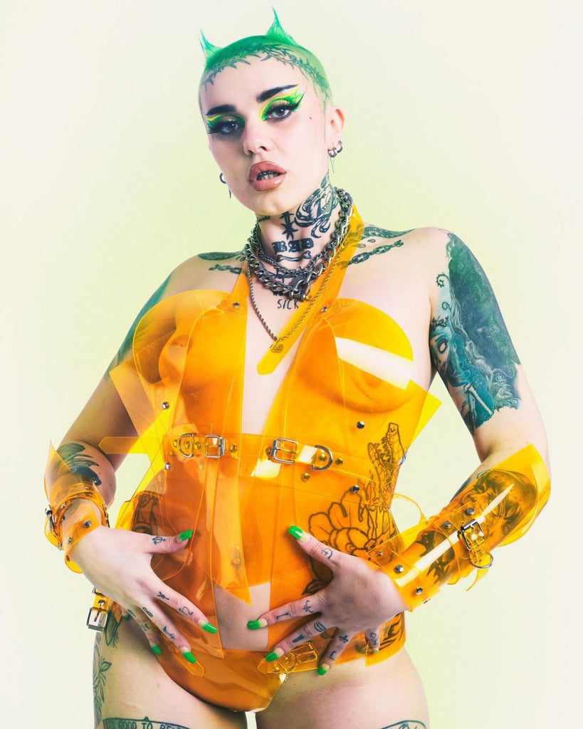 Zand wearing Jivomir Domoustchiev for here latest shots.  Wearing our Shapeshifter PUF coat also our Sculpture harness belted bustier, Robo Hipsters and matching Cuffs crafted to order and available from our home page.
