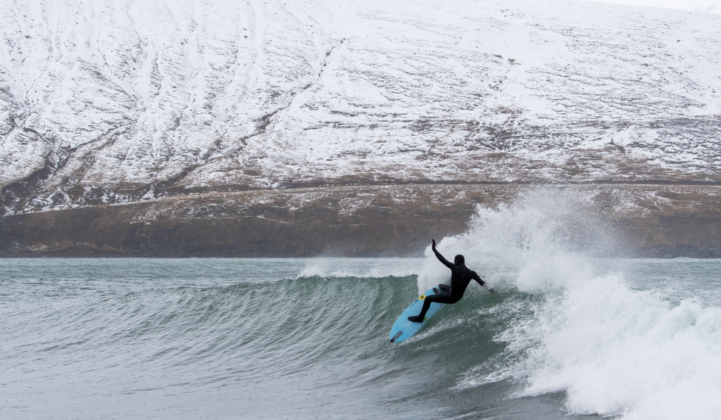 Hunter Jones surfing a wave in Iceland