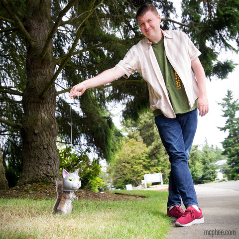 David Wahl holding the Cat Head Squirrel Feeder