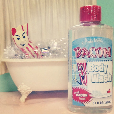 Mr. Bacon is a bath tub with suds bacon body wash in front