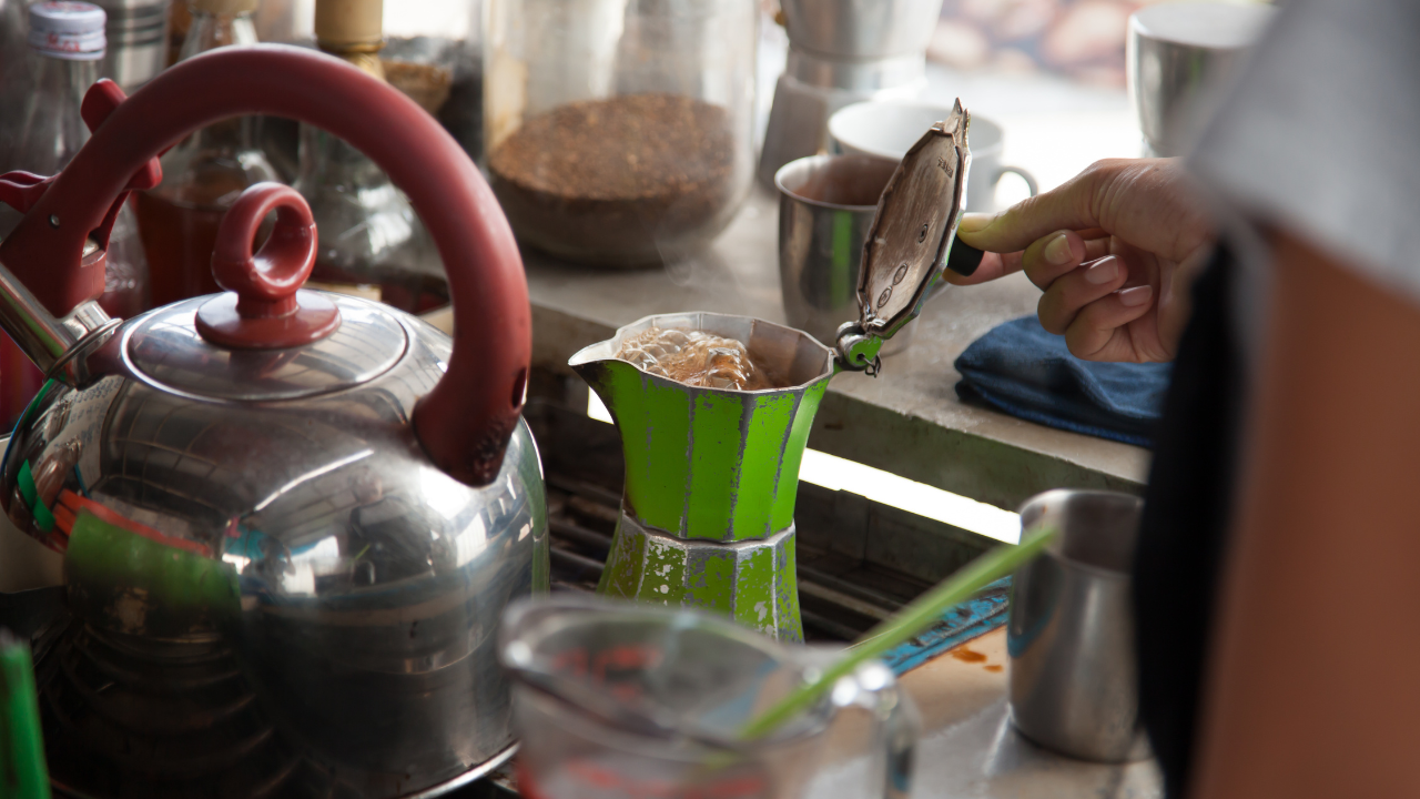 moka pot brewing on stove