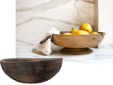 antique wooden bowl with lemons