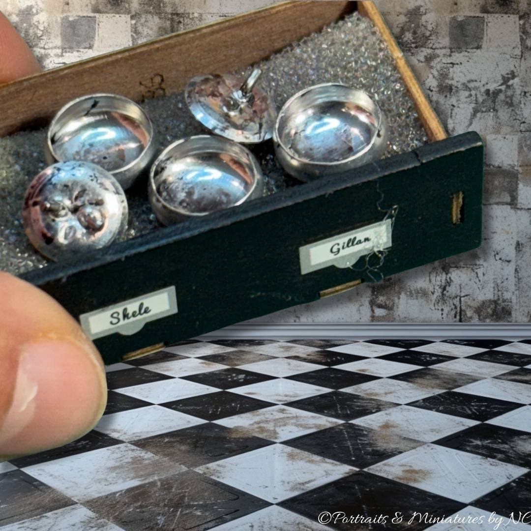 Miniature caps in drawer