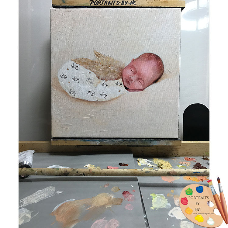 baby painting on easel 606