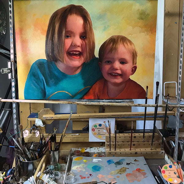 painting-of-kids-on-easel