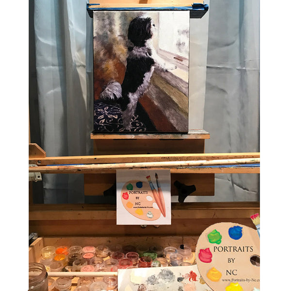 shih tzu painting on easel