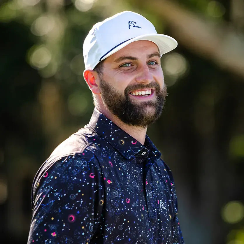 Josh Kelley wearing a Rhoback Polo