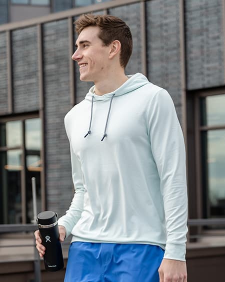 Men holding a flask and wearing The Seafoam Hoodie