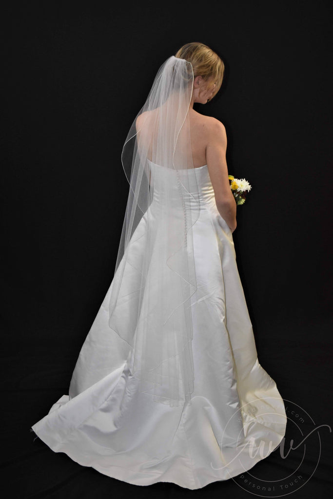 Style TG1015L060: Waltz Length Angel Cut Veil with Sequined Lace Appliqués