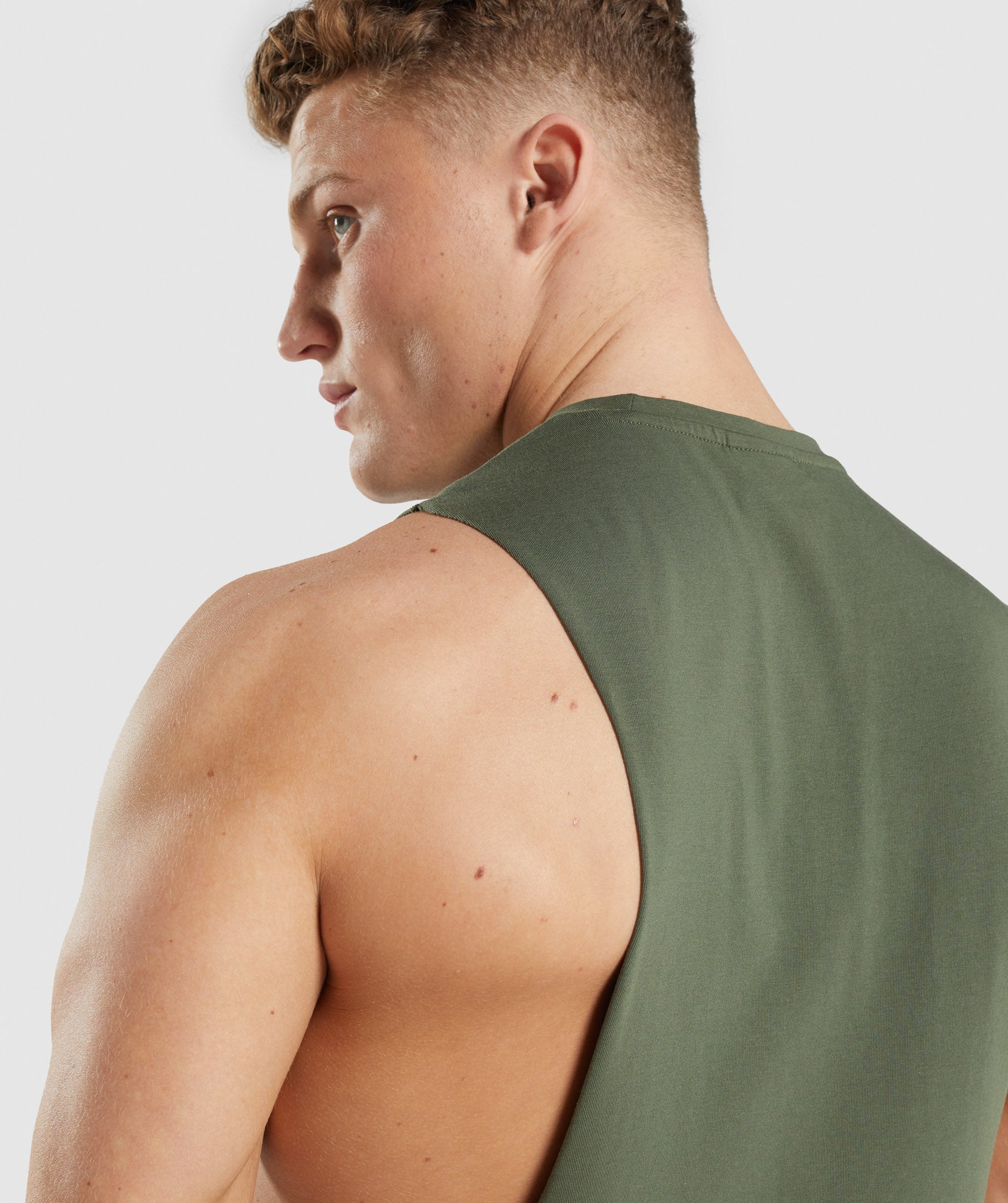 Leg Day Drop Arm Tank in Core Olive