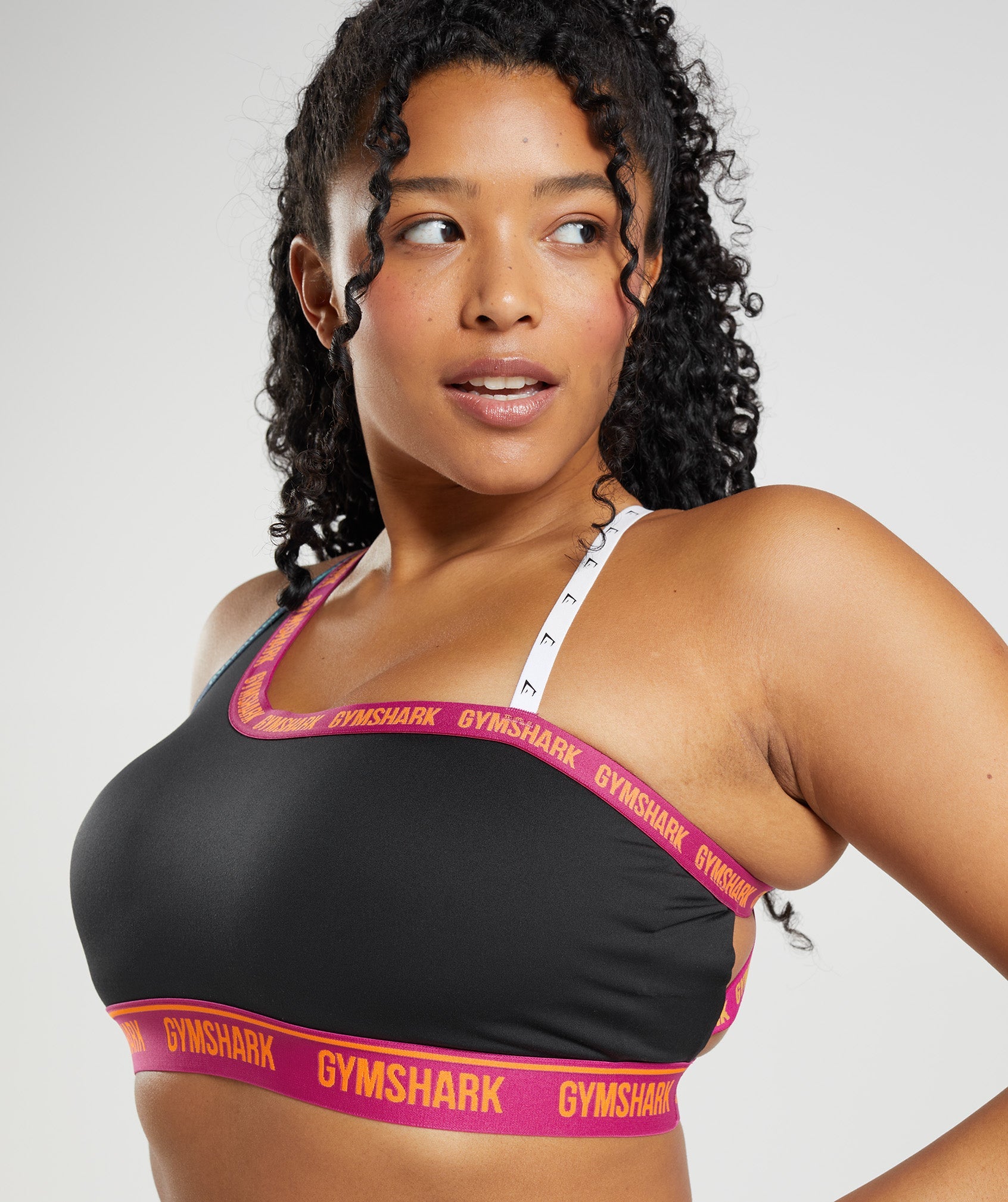 Strike Sports Bra in Black/Dragon Pink/Alpine Green - view 6