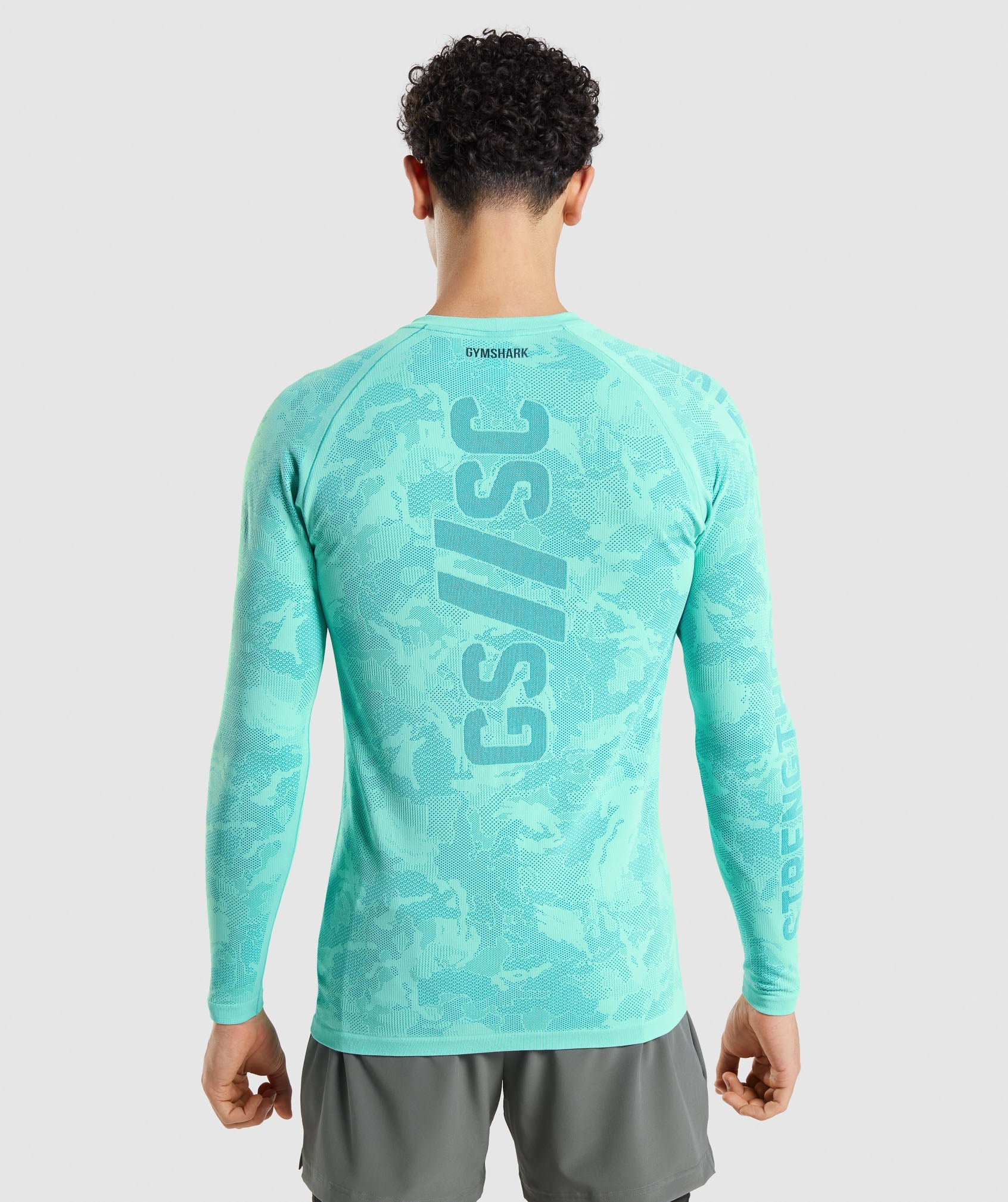 Gymshark//Steve Cook Long Sleeve Seamless T-Shirt in Bright Turquoise/Atlas Blue - view 1