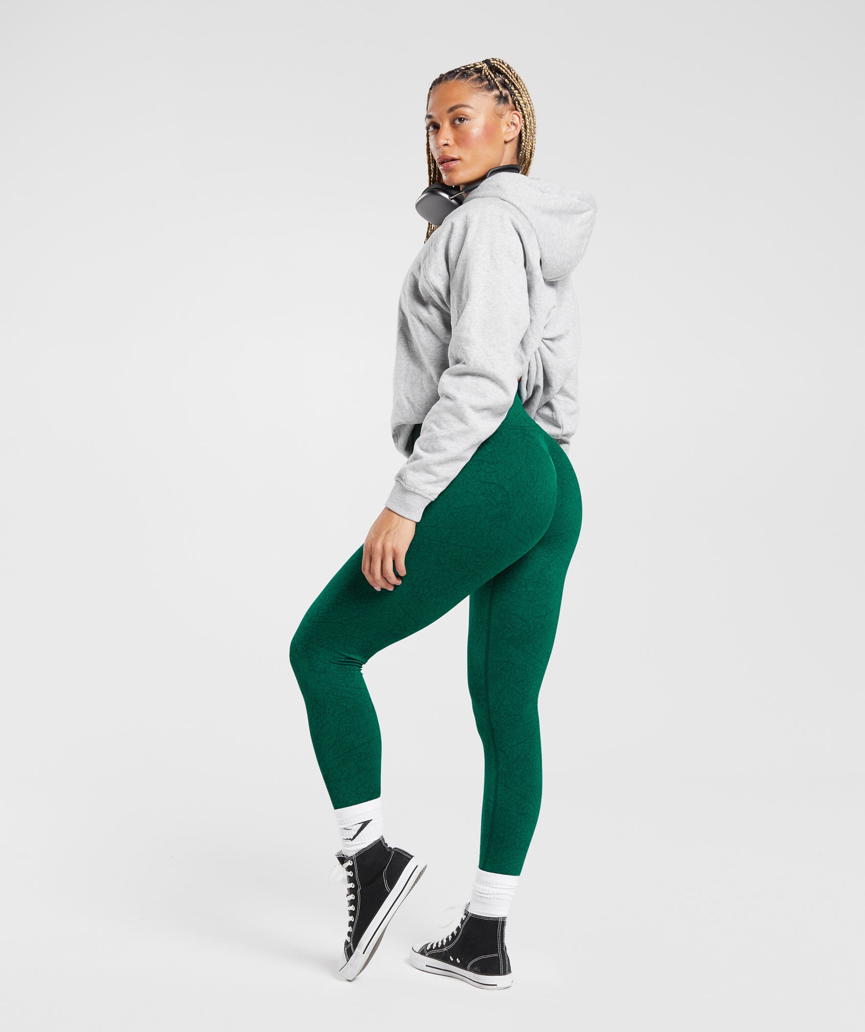 Premium Photo  Girl wears dark green leggings and dark green sleeveless  top isolated sport outfit for summer