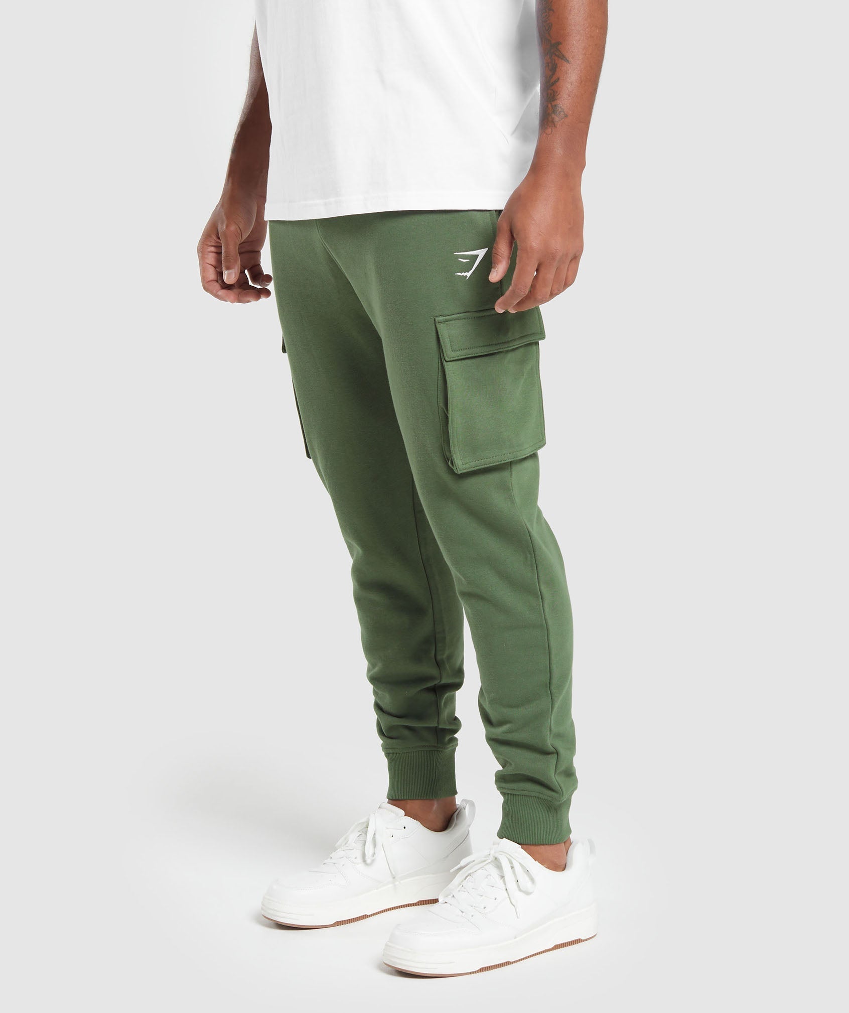 Nike Essentials Fleece cuffed cargo sweatpants in olive green, ASOS
