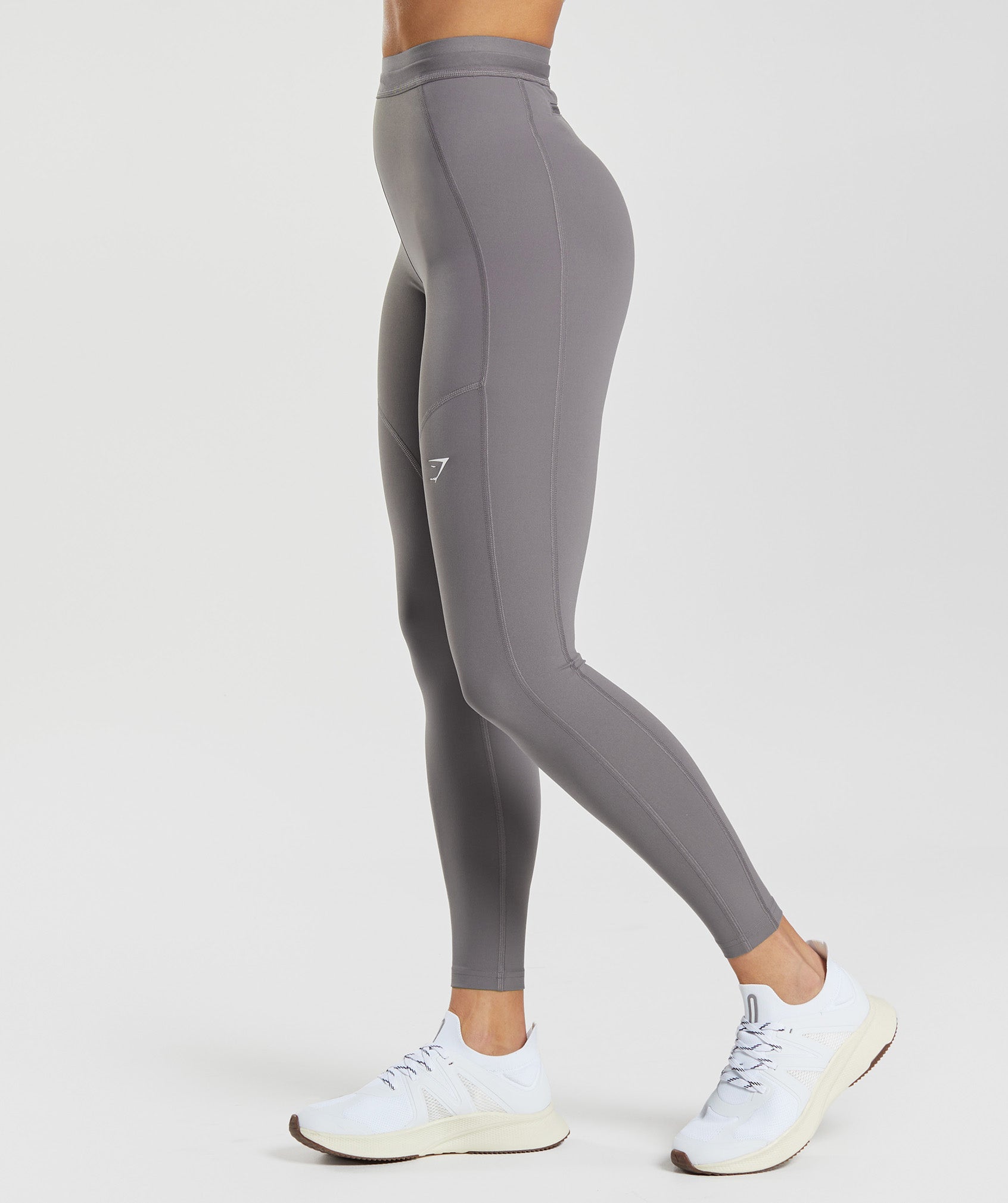 Sleek and Functional Dark Grey Gymshark Leggings with Pocket