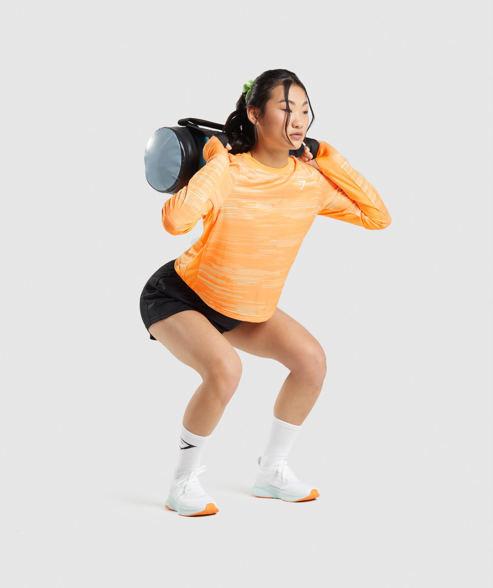 Active Caucasian Female in Red Long Sleeve Jersey and Jogging Outfit  Jumping with Barbells on White Stock Image - Image of inside, portrait:  227595027