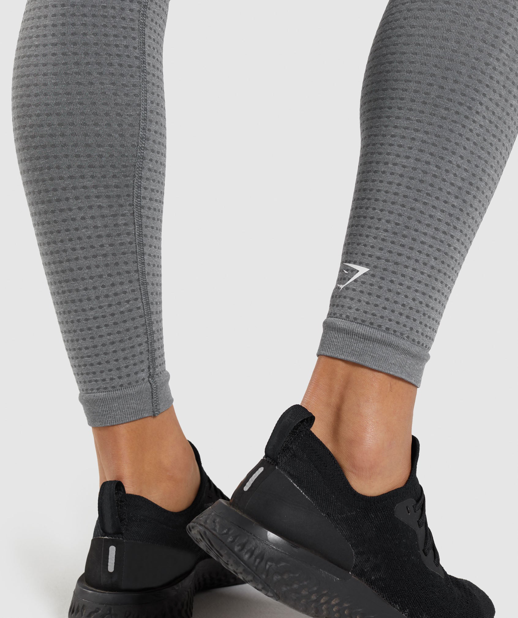 Sleek and Functional Dark Grey Gymshark Leggings with Pocket