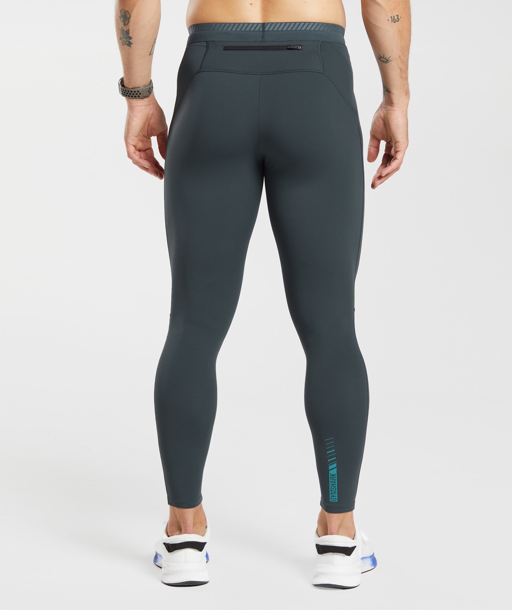 Apex Run Tights in Darkest Teal - view 2