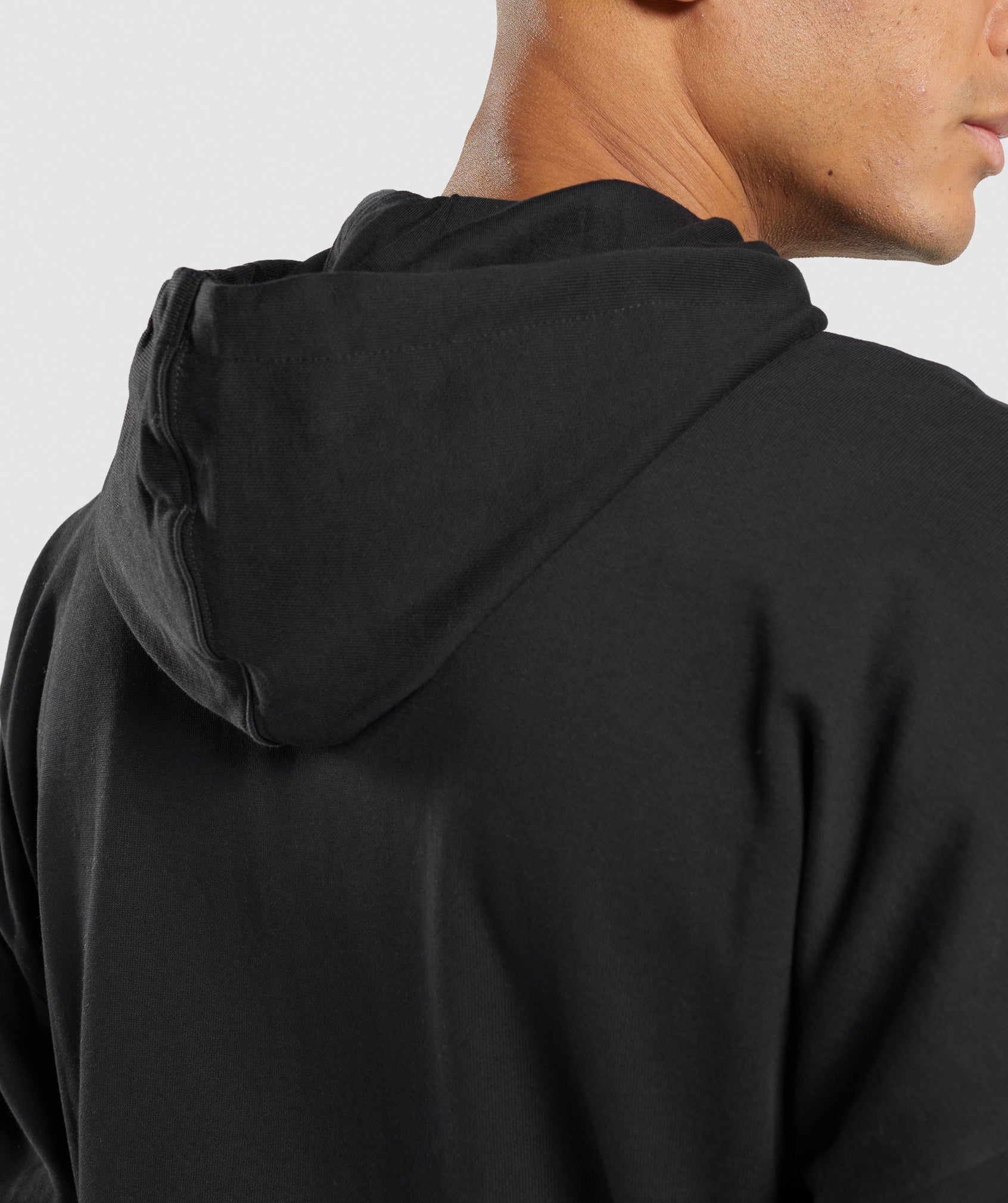 Hoodie Oversize in black, Sharp fit