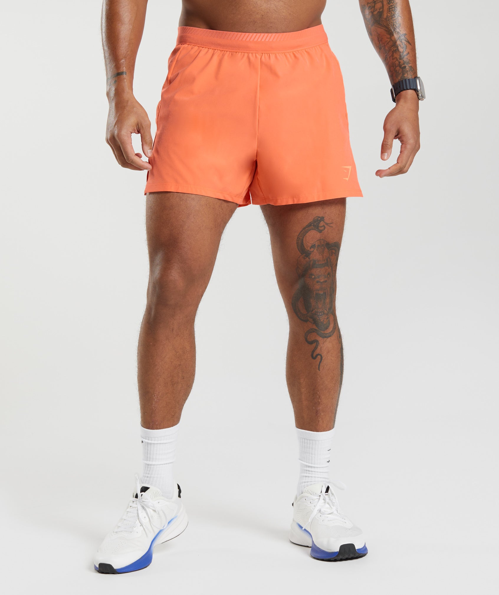 Apex Run 4" Shorts in Solstice Orange