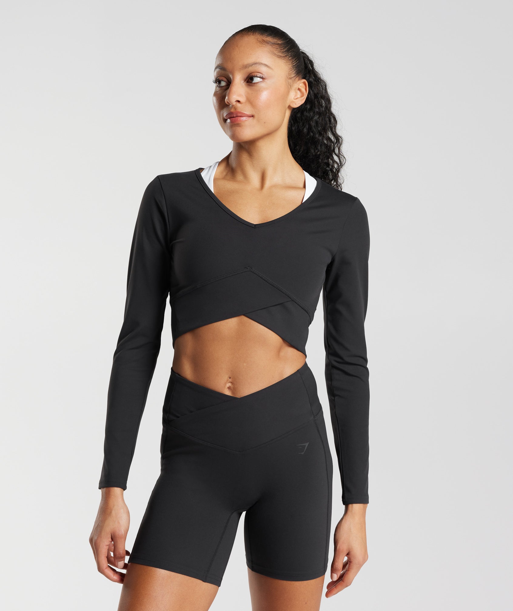 Crossover Long Sleeve Crop Top in Black - view 2