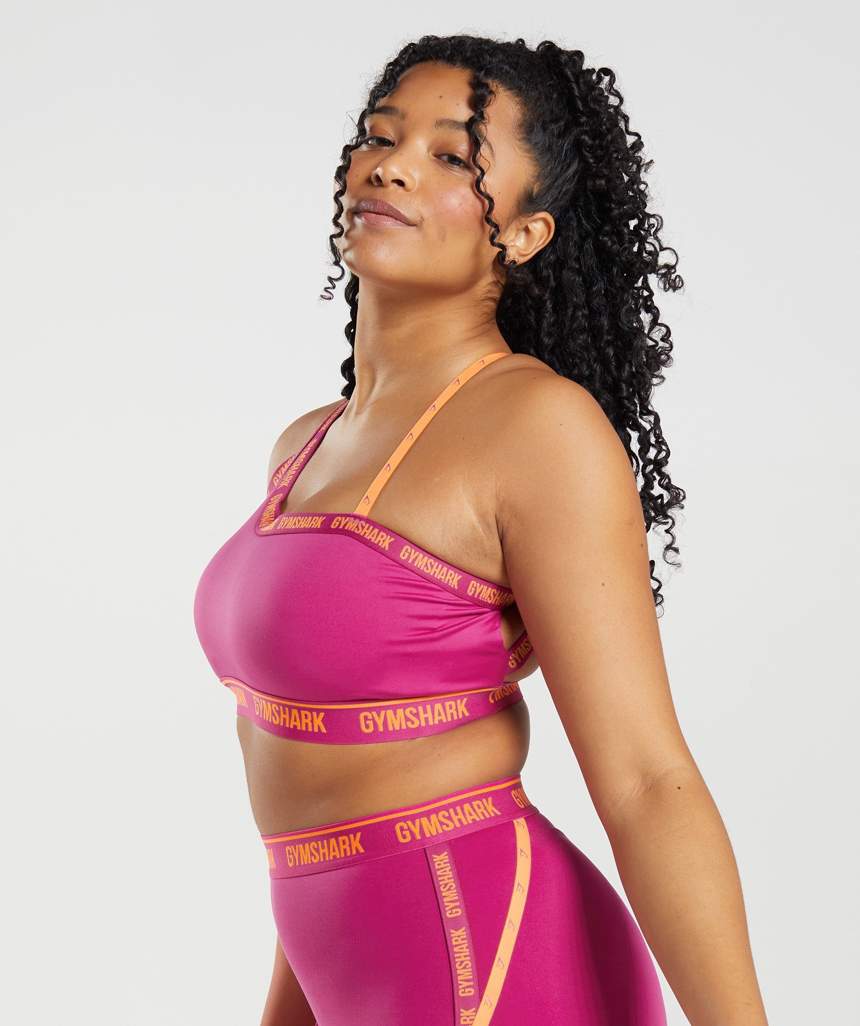 Strike Sports Bra in Dragon Pink/Horizon Orange - view 3