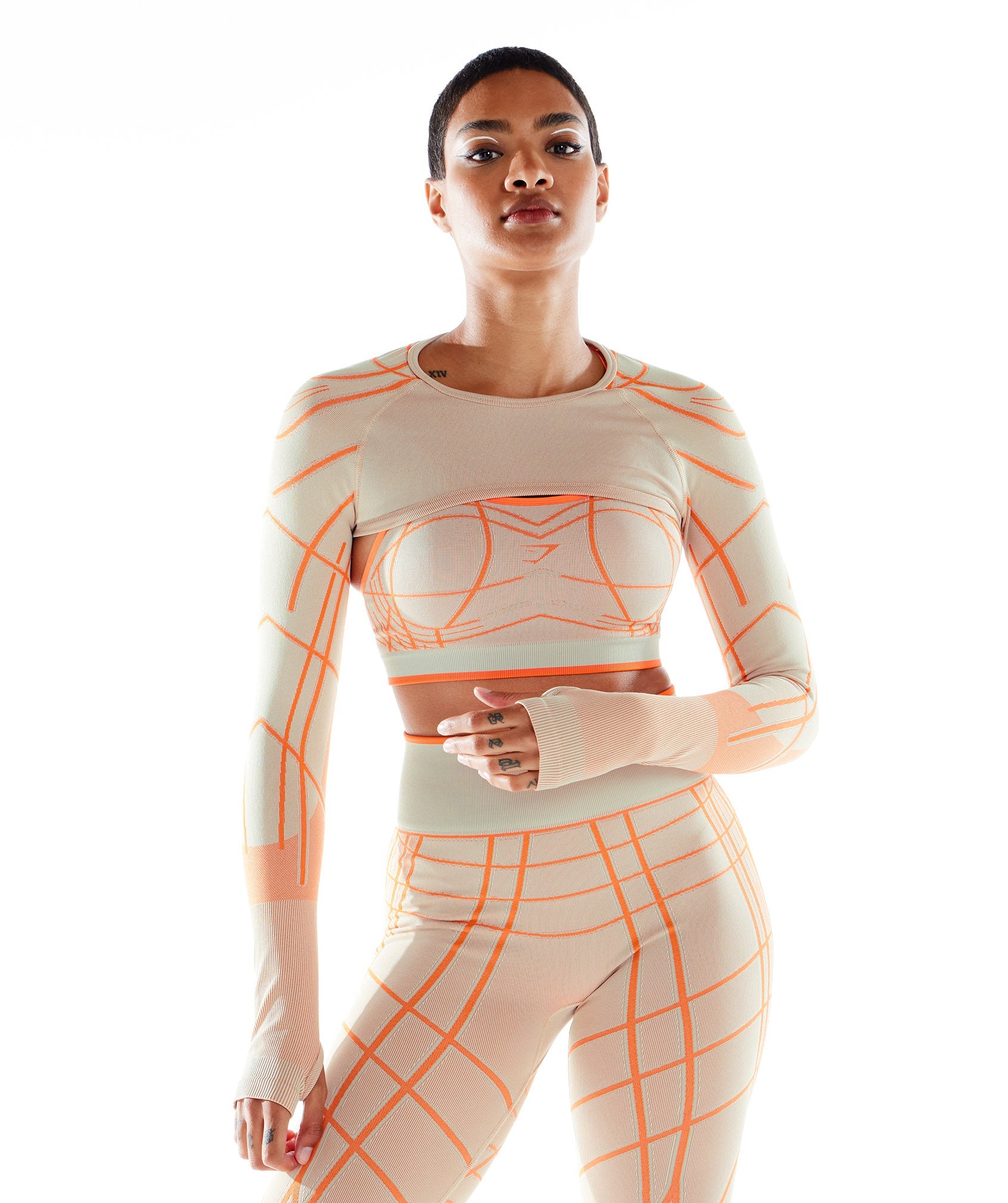 Wtflex Linear Seamless Long Sleeve Shrug in Pebble Grey/Orange/Coconut White - view 1