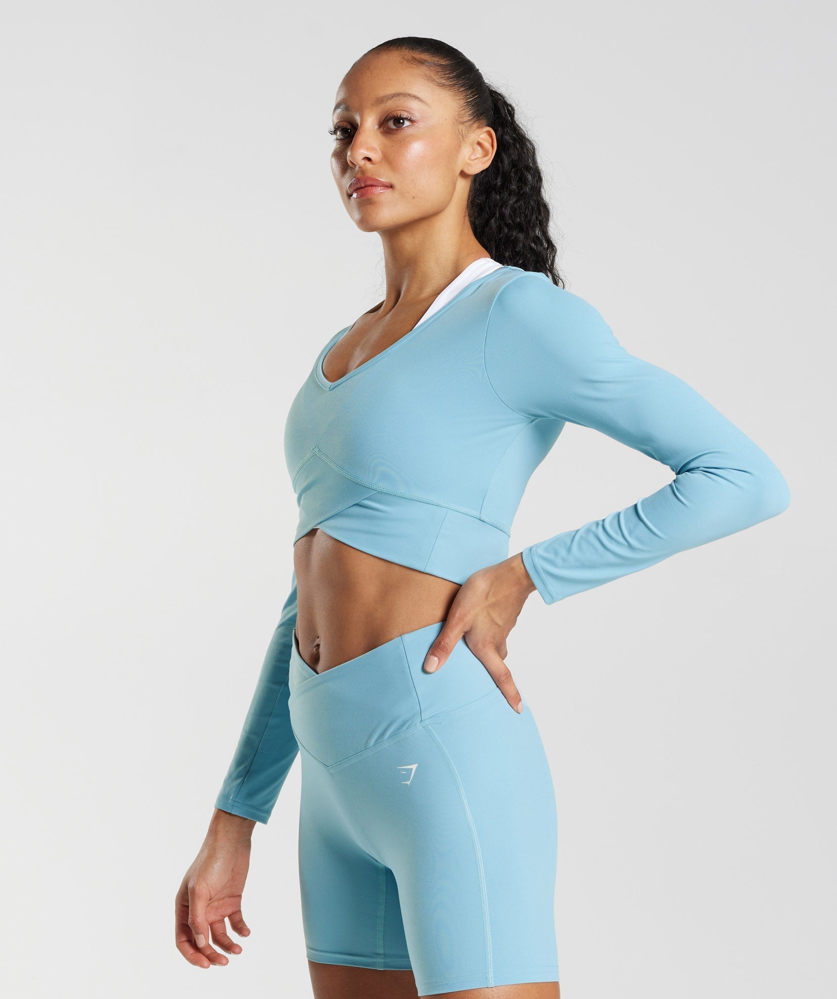 Crossover Long Sleeve Crop Top in Iceberg Blue