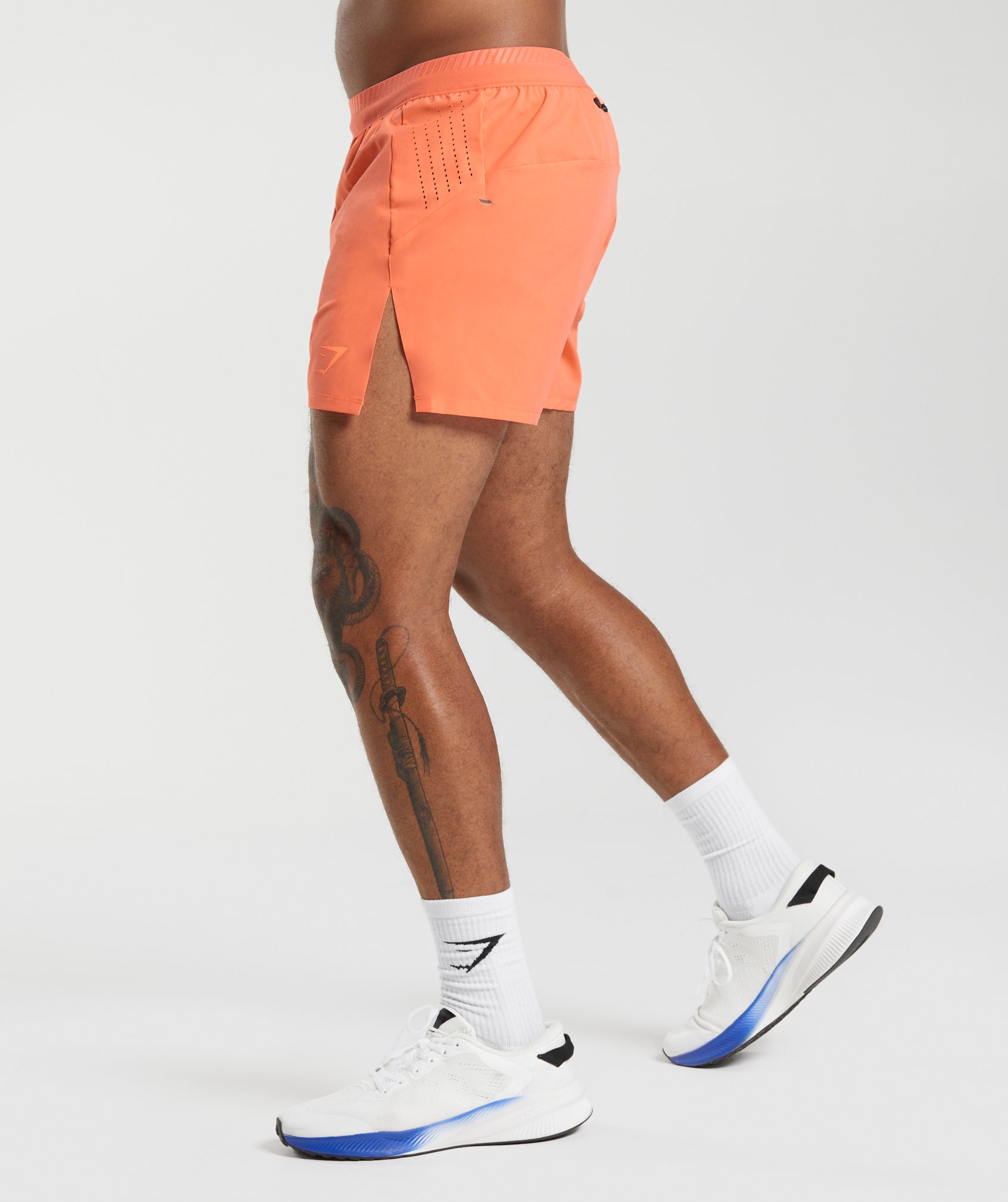 Apex Run 4" Shorts in Solstice Orange