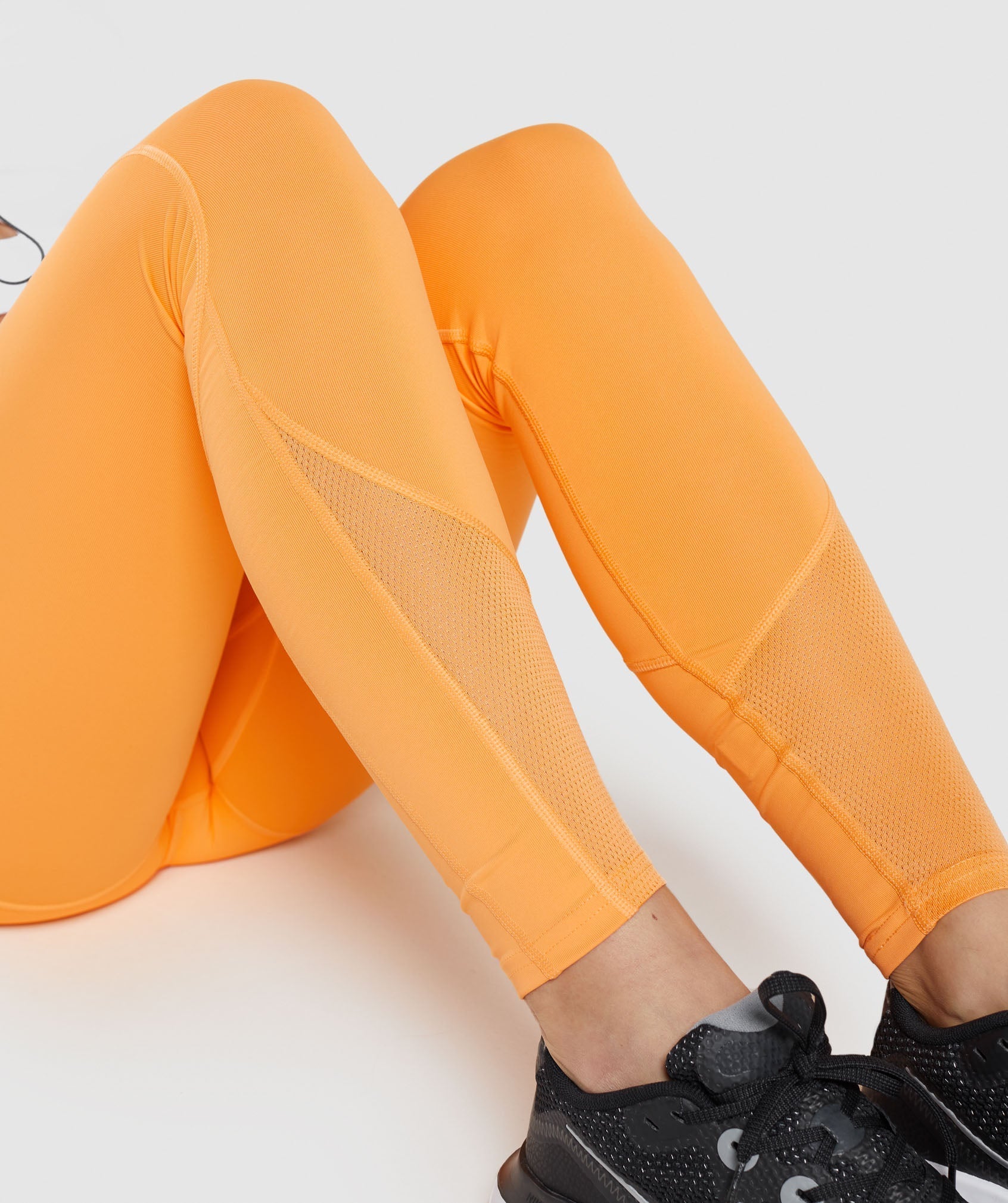 Pulse Mesh Leggings in Apricot Orange