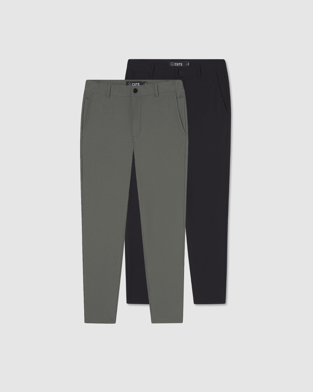  Kit flat lay product photos - One black long sleeve, green sherpa, and dark tan pants 