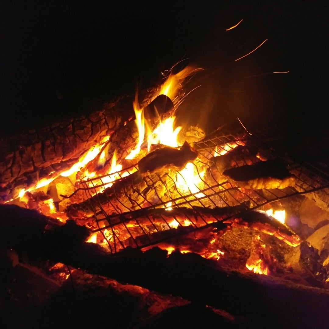 Feu de camp - Steak sur le grille