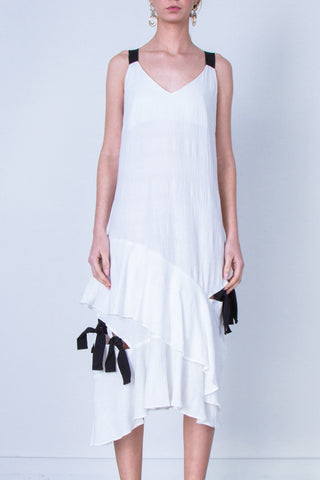 10 Spring Australian Fashion Styles That Embody Playful Minimalism - oskar tassles cut out cotton boho dress