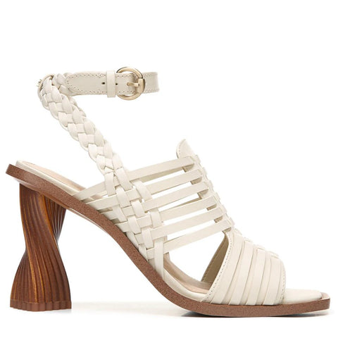 What a show stopper in this elegant strappy sandal with distinct heel detail