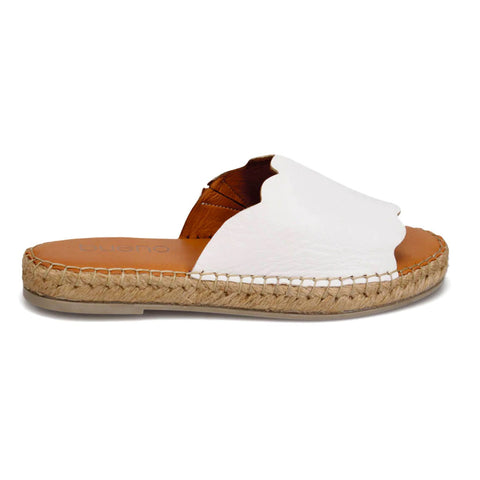 Your summer collection isn't complete without the Naven espadrille slide, a modern update on a timeless classic. With its softly curved leather upper and exceptionally comfy woven sole, this sandal is everyone's summer must-have shoe.