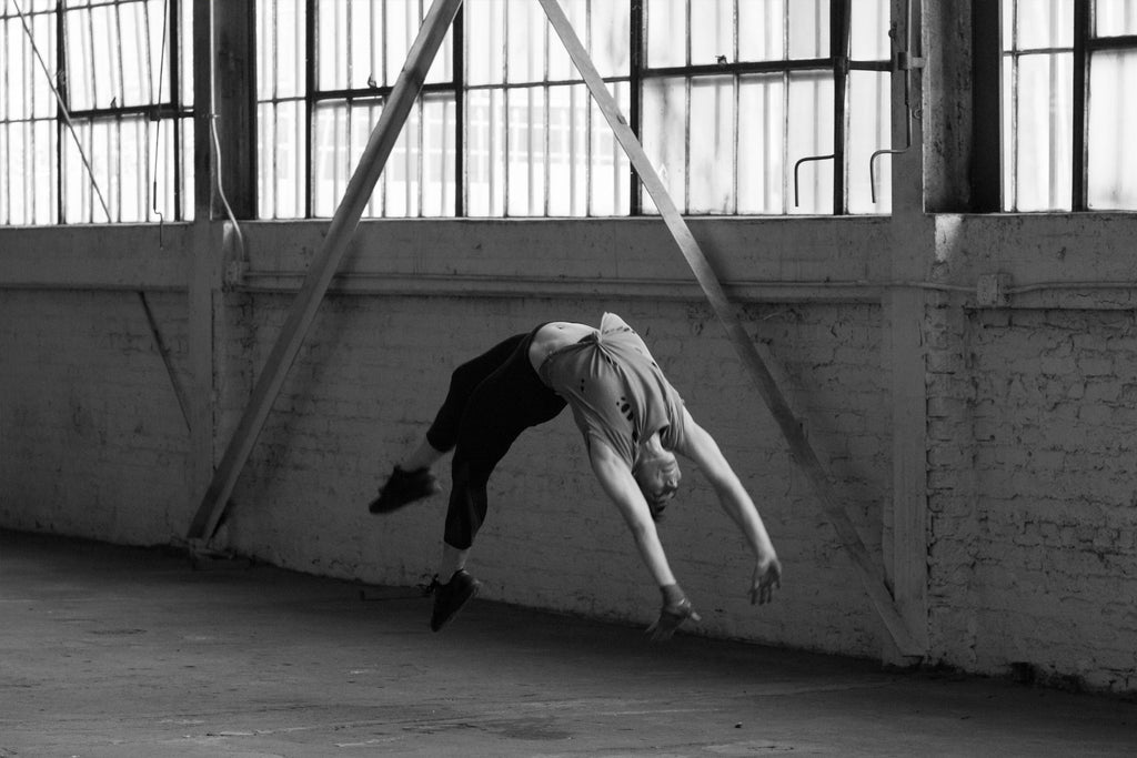 backbending dancer in the air