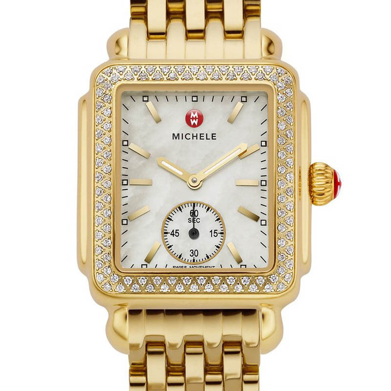 gold watch with diamond bezel