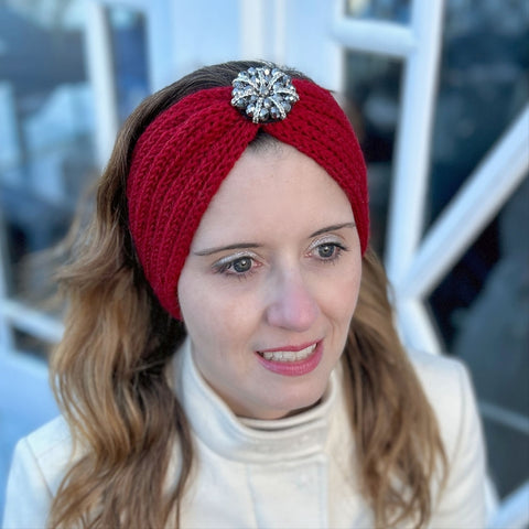 Woman wearing a knitted jewelled headband