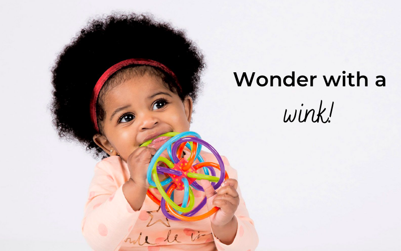 Baby girl teething on Winkel with text - Wonder with a wink!