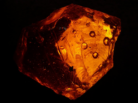 closeup of an amber colored crystal