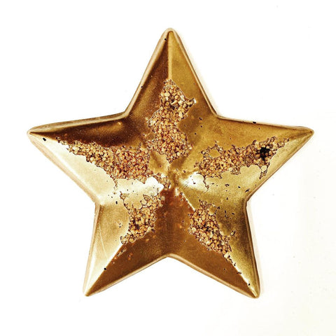 a gold chocolate star made with a FormBox mold