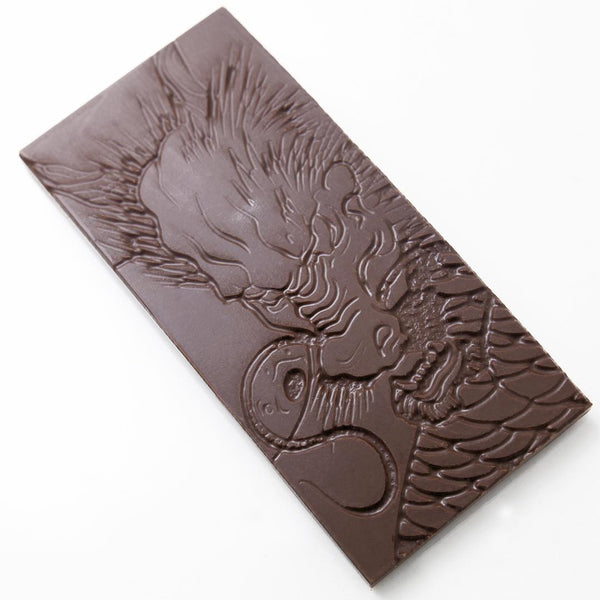 Custom dragon chocolate bar made by vacuum forming over laser-etched wood