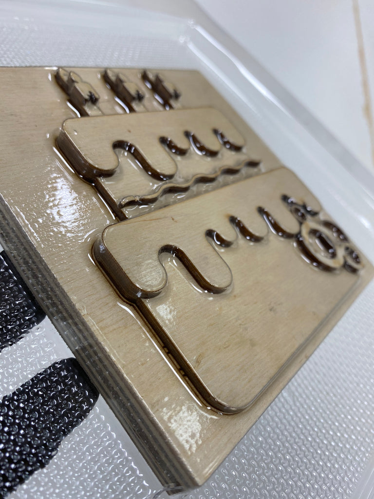 laser cut wood birthday cake in a vacuum formed FormBox mold